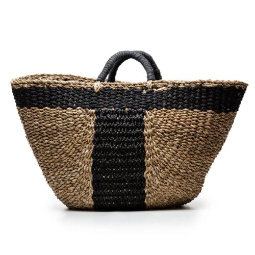 A woven basket with black and white stripes.