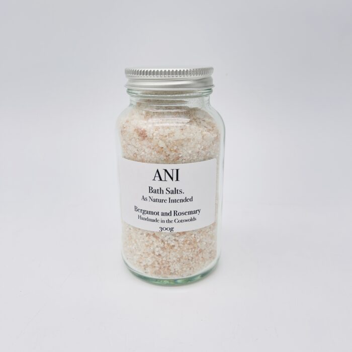A jar of bath salts on a white background.